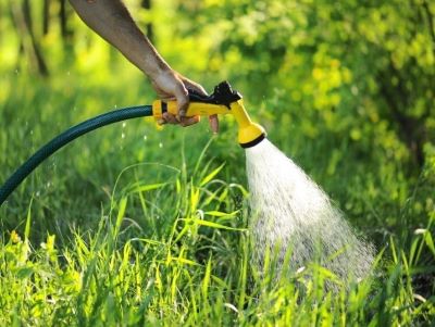 using a water hose using a water hose
